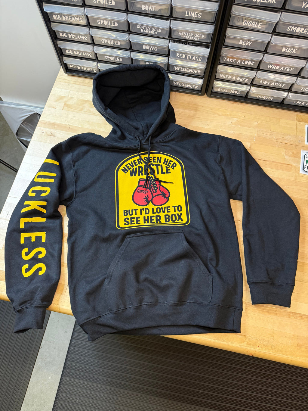 Never Seen Her Wrestle But I'd Love to See Her Box | Funny Men's Premium Black Graphic Hoodie